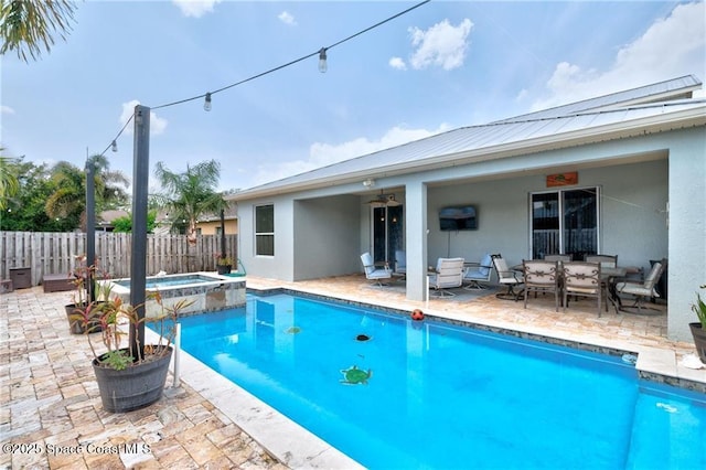 121 Amherst Ln, Sebastian, FL 32958 - view of swimming pool with a fenced backyard, a patio area, a ceiling fan, a pool with connected hot tub, and an outdoor living space