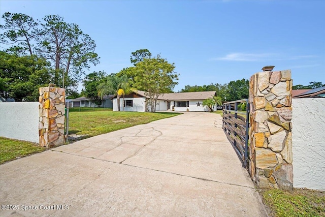 7020 Kaylor Ave, Cocoa, FL 32927 - view of front facade with concrete driveway
