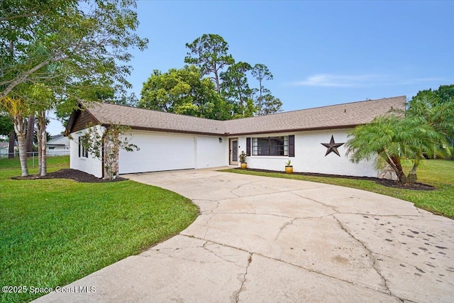 7020 Kaylor Ave, Cocoa, FL 32927 - view of front of house featuring an attached garage, concrete driveway, and stucco siding
