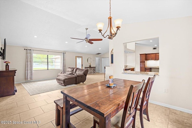 7020 Kaylor Ave, Cocoa, FL 32927 - dining room featuring vaulted ceiling, ceiling fan, a chandelier, recessed lighting, and light tile patterned floors