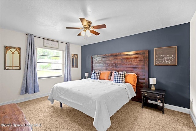 7020 Kaylor Ave, Cocoa, FL 32927 - carpeted bedroom with baseboards and ceiling fan