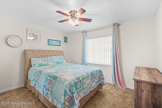 7020 Kaylor Ave, Cocoa, FL 32927 - carpeted bedroom featuring baseboards and ceiling fan