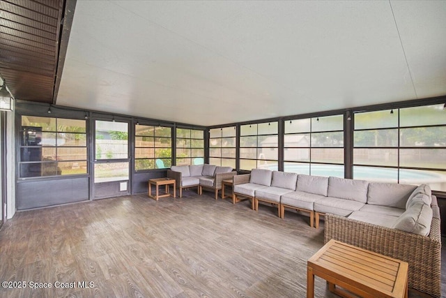 7020 Kaylor Ave, Cocoa, FL 32927 - sunroom featuring an outdoor hangout area