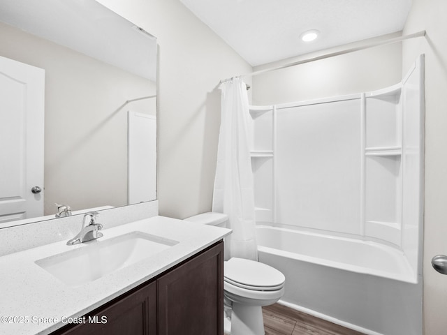 999 Zambrana St SE, Palm Bay, FL 32909 - bathroom with vanity, toilet, wood finished floors, and shower / bath combo