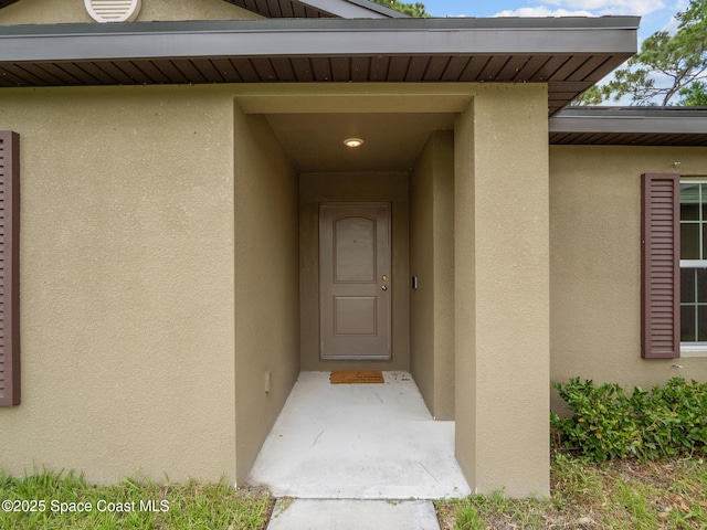 999 Zambrana St SE, Palm Bay, FL 32909 - property entrance featuring stucco siding