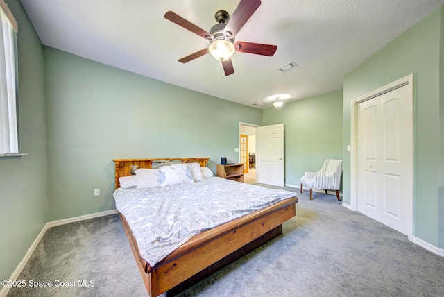 4956 Corfu Dr, Cocoa, FL 32926 - bedroom featuring carpet, baseboards, and ceiling fan