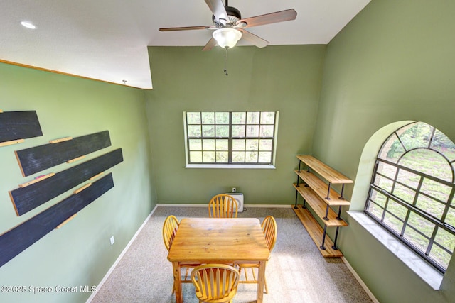 4956 Corfu Dr, Cocoa, FL 32926 - carpeted dining room with a ceiling fan, plenty of natural light, and baseboards