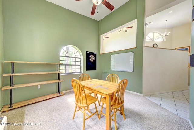4956 Corfu Dr, Cocoa, FL 32926 - carpeted dining room with ceiling fan, baseboards, and a chandelier