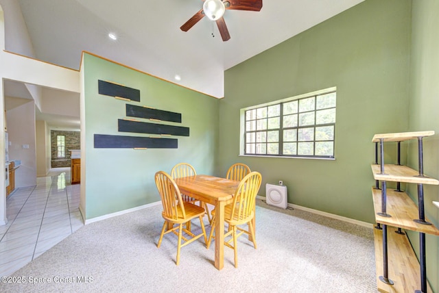 4956 Corfu Dr, Cocoa, FL 32926 - dining room featuring a ceiling fan, baseboards, carpet floors, recessed lighting, and high vaulted ceiling