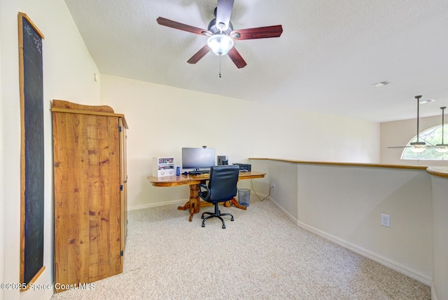 4956 Corfu Dr, Cocoa, FL 32926 - home office with ceiling fan, carpet, baseboards, and a textured ceiling