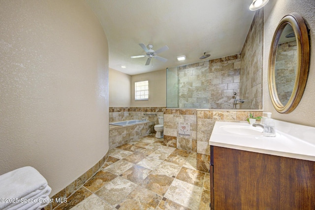 4956 Corfu Dr, Cocoa, FL 32926 - full bathroom featuring a bath, a ceiling fan, vanity, a tile shower, and toilet