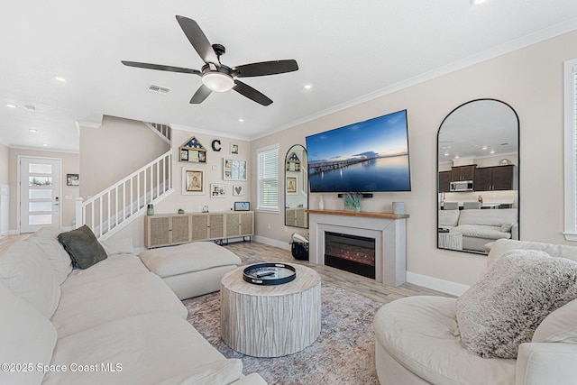 786 Clearwater Ave, Satellite Beach, FL 32937 - living area featuring stairway, ornamental molding, recessed lighting, healthy amount of natural light, and ceiling fan