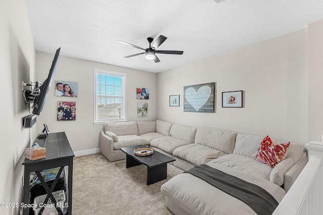 786 Clearwater Ave, Satellite Beach, FL 32937 - carpeted living room with ceiling fan and a textured ceiling