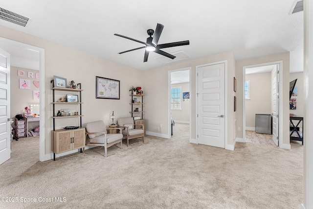 786 Clearwater Ave, Satellite Beach, FL 32937 - living area featuring ceiling fan and light colored carpet