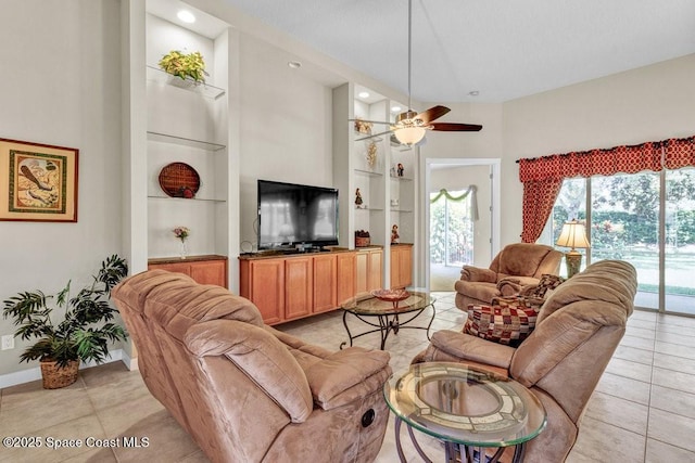 5209 Eleuthra Cir, Vero Beach, FL 32967 - living area with built in features, recessed lighting, baseboards, light tile patterned flooring, and ceiling fan
