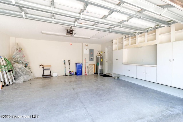 5209 Eleuthra Cir, Vero Beach, FL 32967 - garage with electric water heater, a garage door opener, and electric panel