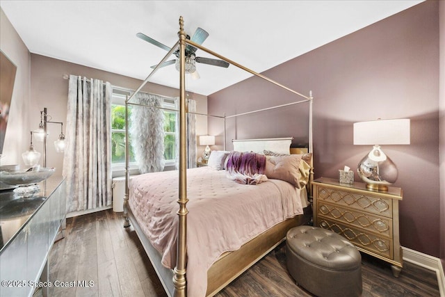 1039 Steven Patrick Ave, Indian Harbour Beach, FL 32937 - bedroom featuring wood finished floors, ceiling fan, and baseboards