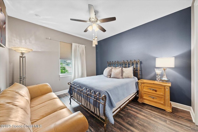 1039 Steven Patrick Ave, Indian Harbour Beach, FL 32937 - bedroom featuring baseboards, wood finished floors, and a ceiling fan