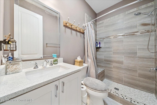 1039 Steven Patrick Ave, Indian Harbour Beach, FL 32937 - full bath featuring vanity, a tile shower, toilet, and tile patterned floors