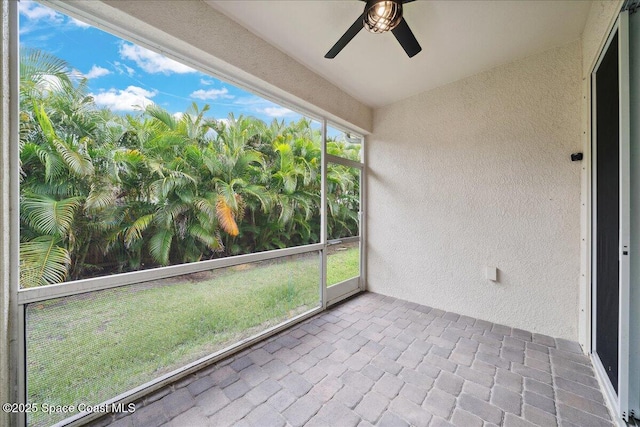 1039 Steven Patrick Ave, Indian Harbour Beach, FL 32937 - unfurnished sunroom with ceiling fan