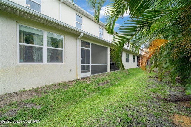 1039 Steven Patrick Ave, Indian Harbour Beach, FL 32937 - view of grassy yard with a sunroom