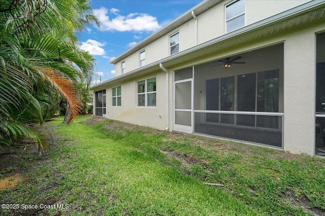 1039 Steven Patrick Ave, Indian Harbour Beach, FL 32937 - view of grassy yard featuring a sunroom