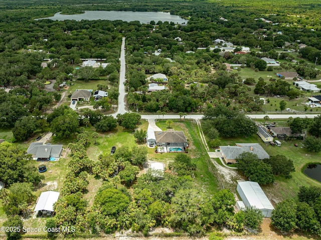4725 Papaya St, Cocoa, FL 32926 - aerial view of property's location with a nearby body of water and a heavily wooded area