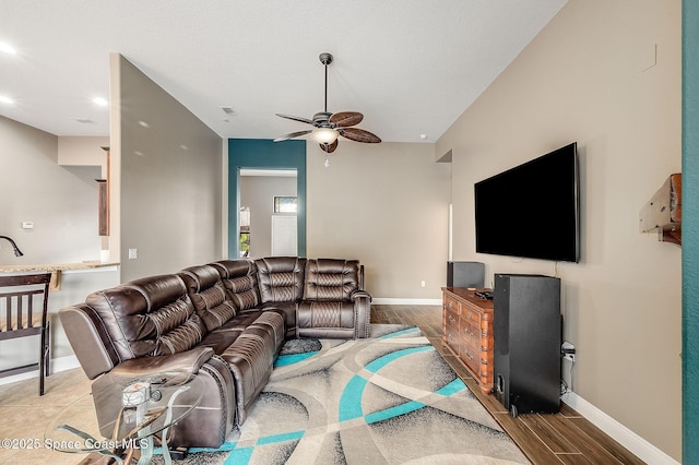 4725 Papaya St, Cocoa, FL 32926 - living area featuring wood finished floors, a ceiling fan, baseboards, and recessed lighting