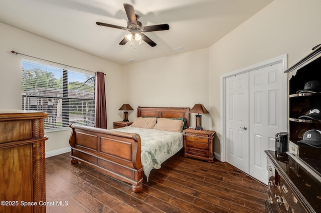 4725 Papaya St, Cocoa, FL 32926 - bedroom with wood finished floors, baseboards, ceiling fan, and a closet