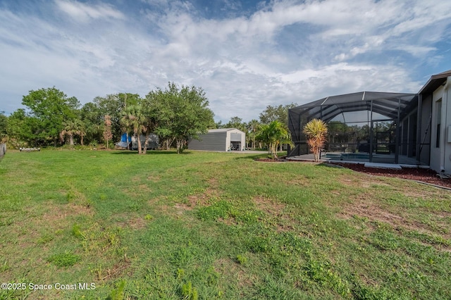 4725 Papaya St, Cocoa, FL 32926 - view of grassy yard with glass enclosure