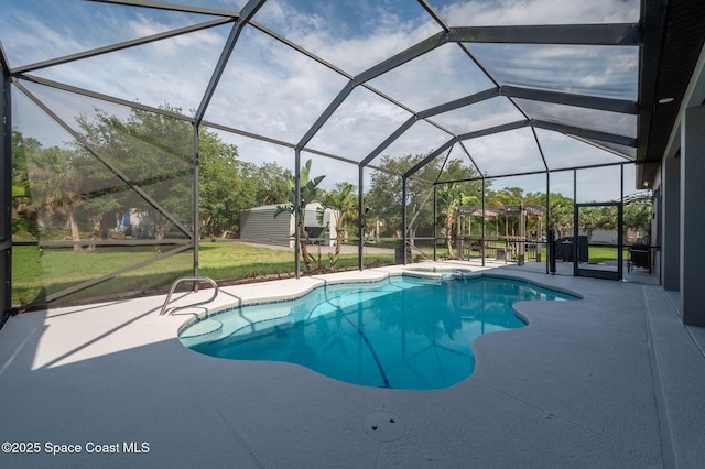 4725 Papaya St, Cocoa, FL 32926 - view of swimming pool with a patio, a pool with connected hot tub, a yard, and glass enclosure