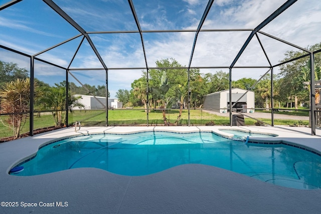 4725 Papaya St, Cocoa, FL 32926 - view of swimming pool with a yard, a pool with connected hot tub, and glass enclosure