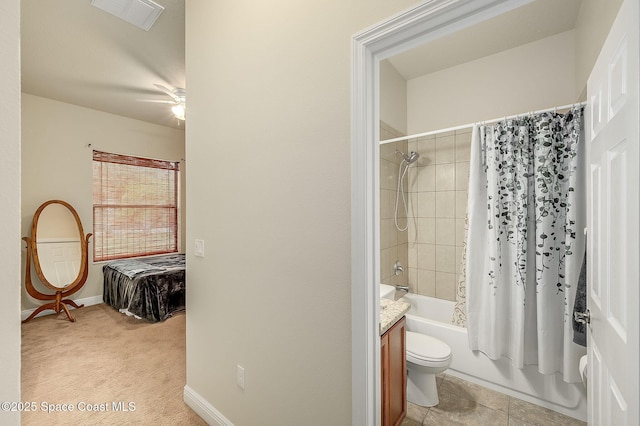 4725 Papaya St, Cocoa, FL 32926 - bathroom with toilet, shower / bath combination with curtain, vanity, a ceiling fan, and baseboards