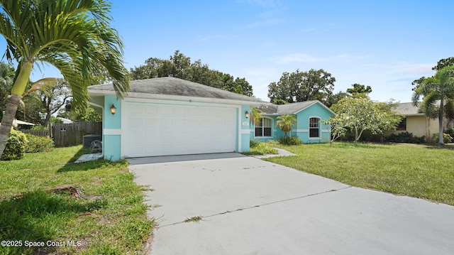 525 Banana Blvd, Merritt Island, FL 32952 - ranch-style house featuring driveway, stucco siding, and a garage