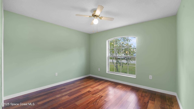 525 Banana Blvd, Merritt Island, FL 32952 - spare room featuring baseboards, hardwood / wood-style flooring, and ceiling fan