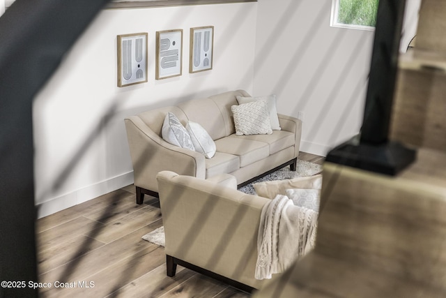 1313 Worth Ct NE, Palm Bay, FL 32905 - living area with wood finished floors and baseboards