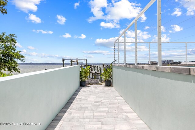 1313 Worth Ct NE, Palm Bay, FL 32905 - view of patio with a water view