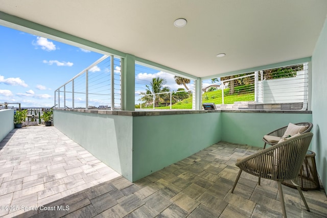 1313 Worth Ct NE, Palm Bay, FL 32905 - view of patio with a balcony