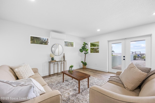 1313 Worth Ct NE, Palm Bay, FL 32905 - living room with a wall unit AC, recessed lighting, wood finished floors, french doors, and baseboards