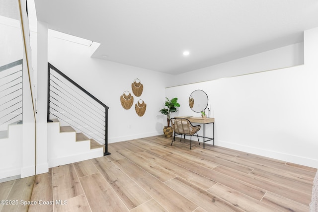 1313 Worth Ct NE, Palm Bay, FL 32905 - interior space featuring light wood-style flooring, stairs, recessed lighting, and baseboards