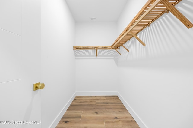 1313 Worth Ct NE, Palm Bay, FL 32905 - spacious closet featuring wood finished floors