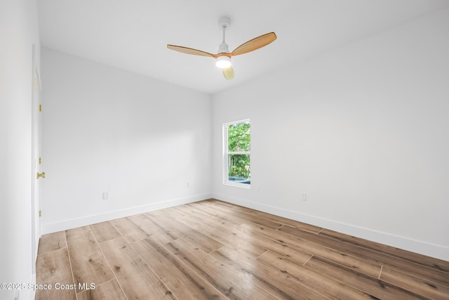 1313 Worth Ct NE, Palm Bay, FL 32905 - empty room featuring light wood-style flooring, baseboards, and ceiling fan