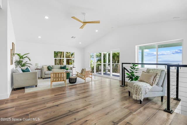 1313 Worth Ct NE, Palm Bay, FL 32905 - sitting room with light wood finished floors, a ceiling fan, healthy amount of natural light, recessed lighting, and high vaulted ceiling