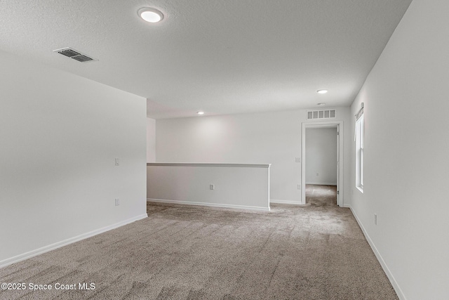 2205 Sapelo Ave SE, Palm Bay, FL 32909 - unfurnished room with carpet, recessed lighting, and baseboards