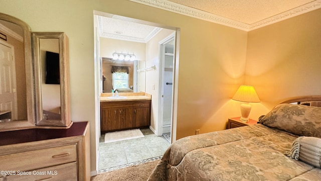 803 Crossbow Dr, West Melbourne, FL 32904 - tiled bedroom with ornamental molding, a sink, and ensuite bath