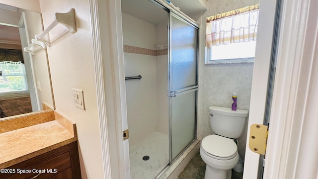 803 Crossbow Dr, West Melbourne, FL 32904 - full bathroom featuring toilet, vanity, and a stall shower