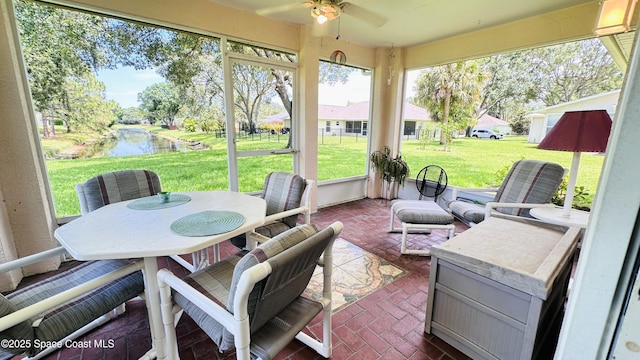 803 Crossbow Dr, West Melbourne, FL 32904 - sunroom / solarium with ceiling fan, a water view, and outdoor dining area