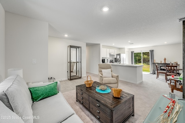 499 Grenadier Ave NW, Palm Bay, FL 32907 - living room featuring recessed lighting, a textured ceiling, and baseboards