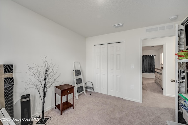499 Grenadier Ave NW, Palm Bay, FL 32907 - sitting room with light carpet and baseboards