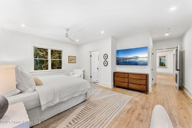 4185 Crooked Mile Rd, Merritt Island, FL 32952 - bedroom with crown molding, recessed lighting, light wood-style floors, baseboards, and a ceiling fan